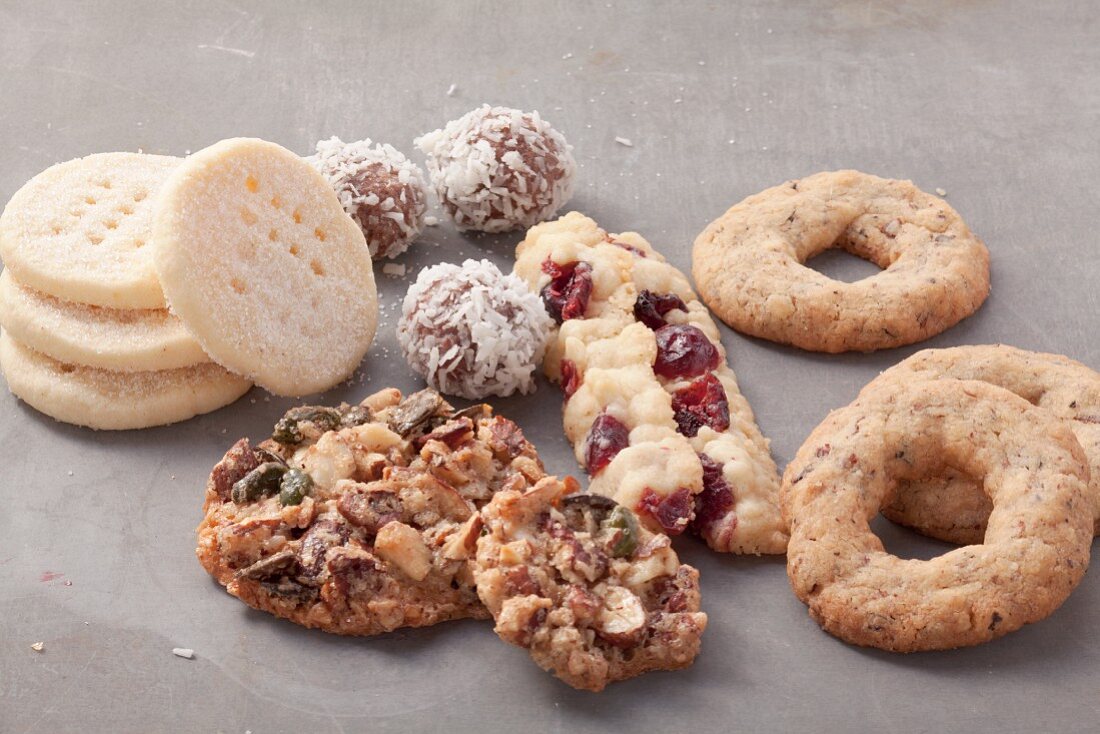 Assorted cookies on a gray surface