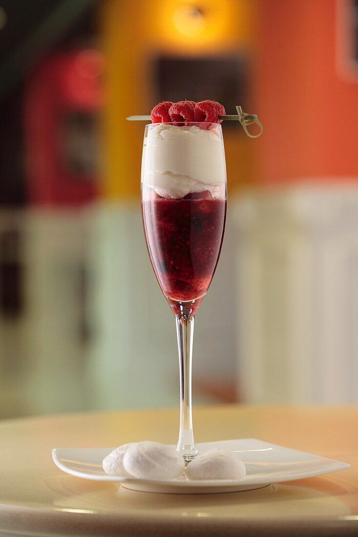 Raspberry dessert in champagne glass