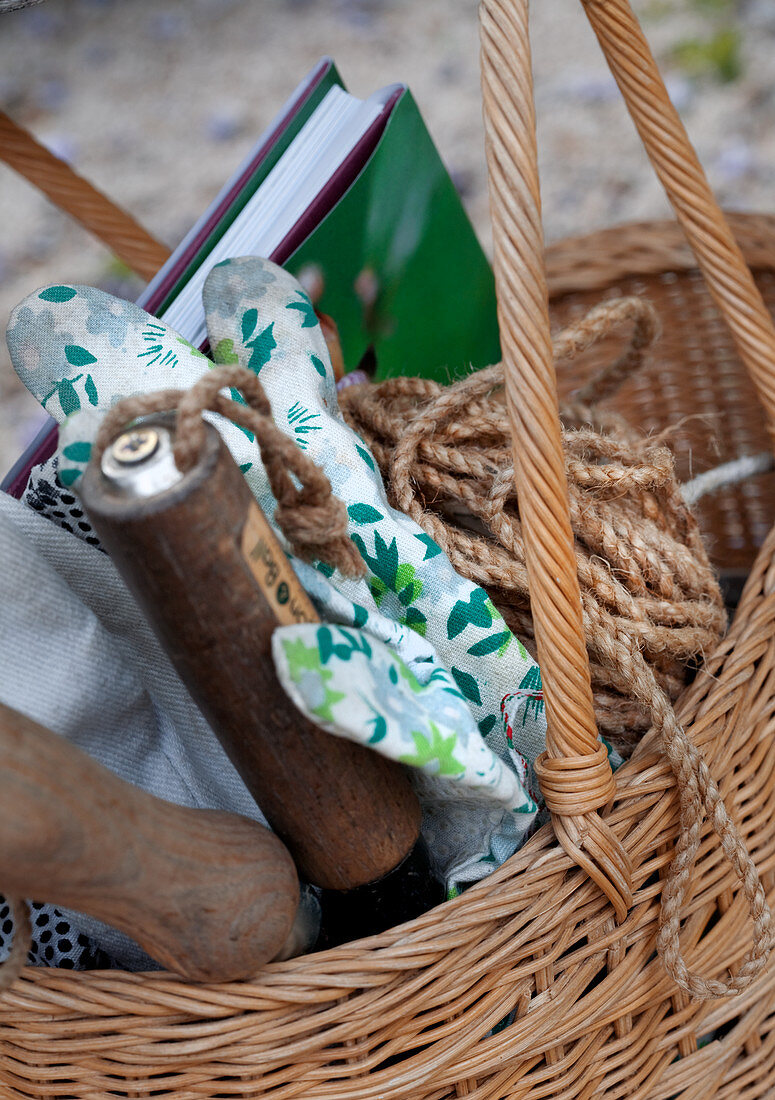 Basket of gardening utensils