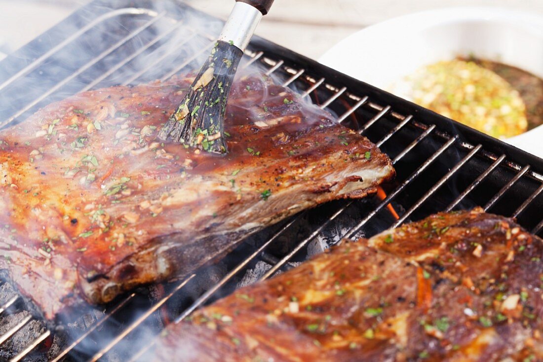 Marinated spare ribs on a grill