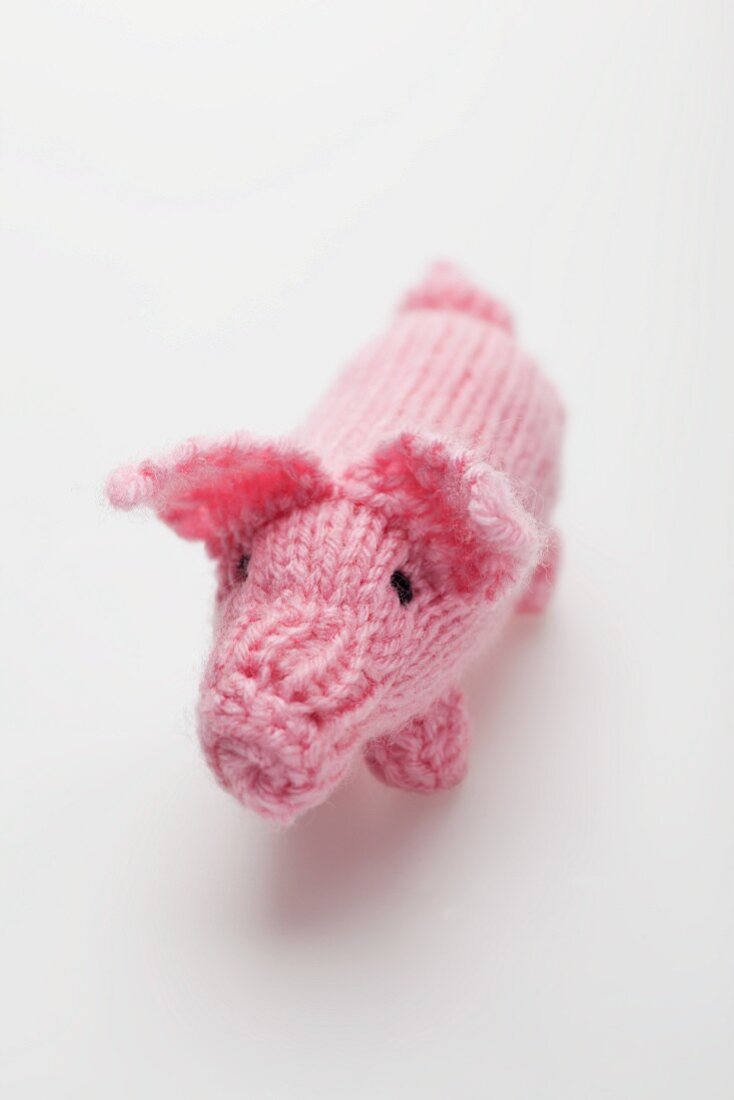 Knitted piglet lucky charm
