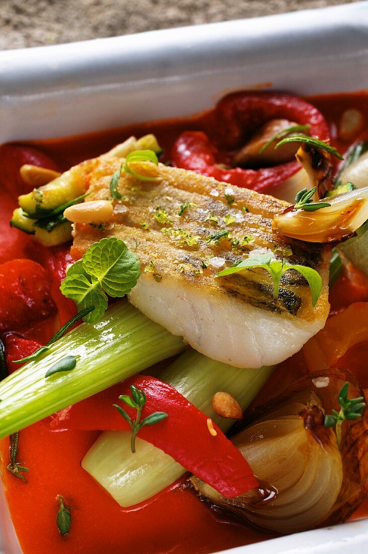 Zander with tomatoes and Mediterranean vegetables