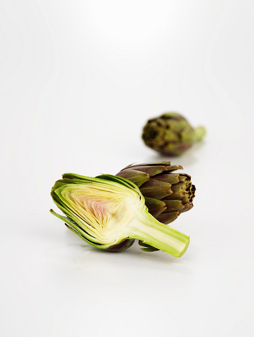 Artichokes, whole and halved