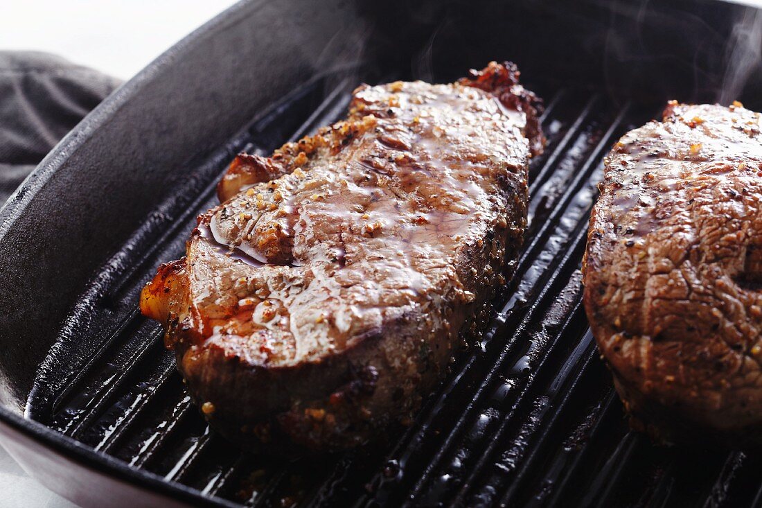 Steaks Cooking in a Grill Pan