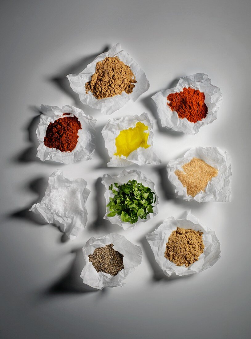 A variety of spices in parchment