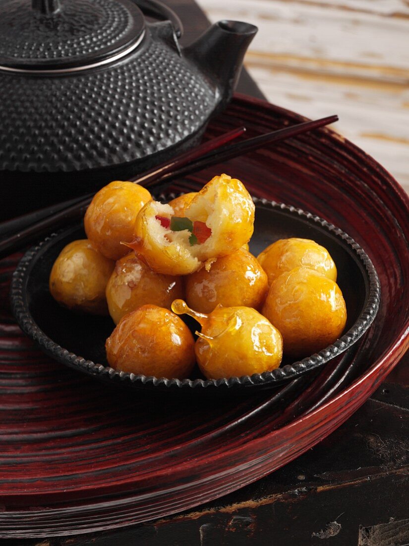 Fruity potato balls with caramel shells