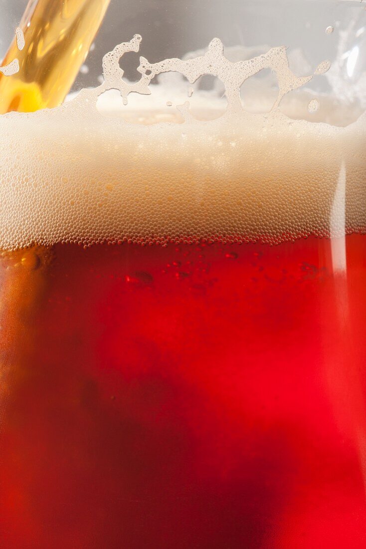 Amber Ale Pouring into a Glass