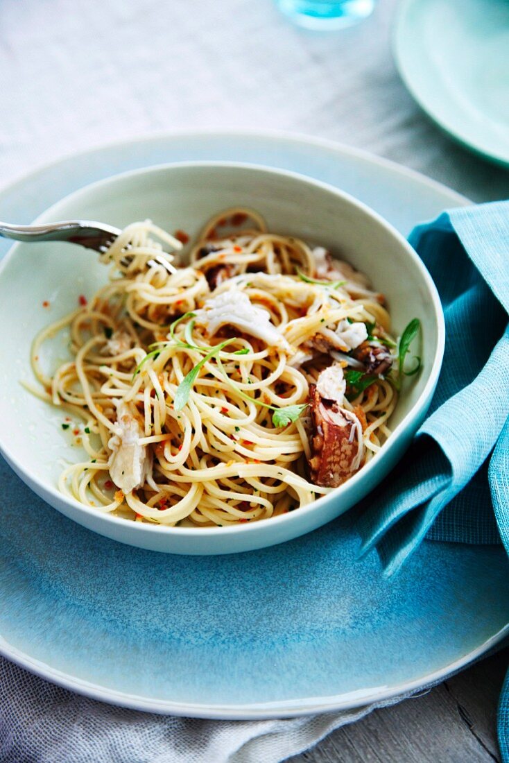 Spaghettini with crab meat, garlic and chili