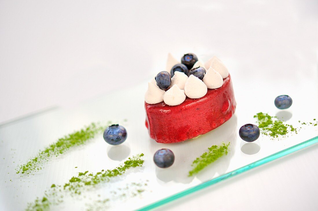 Blueberry mousse with piped cream