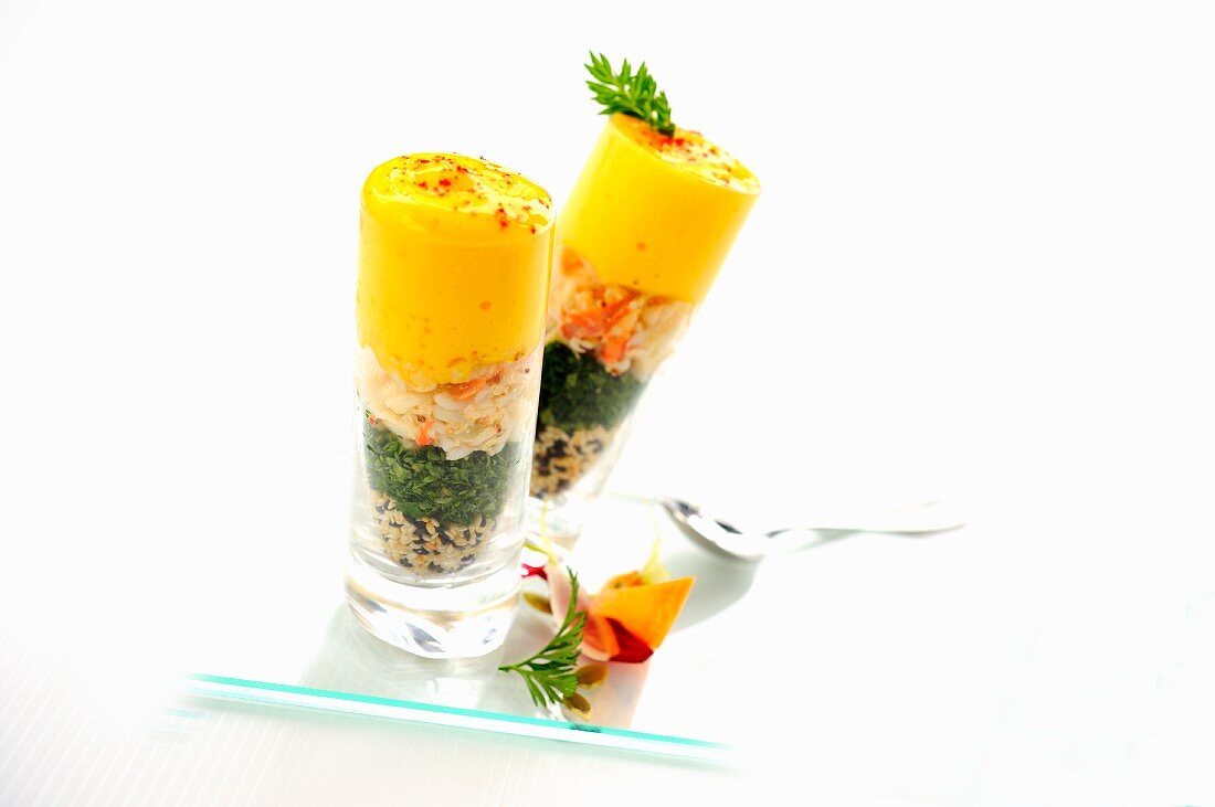 Shrimp salad with sesame and passion fruit froth in cocktail glasses