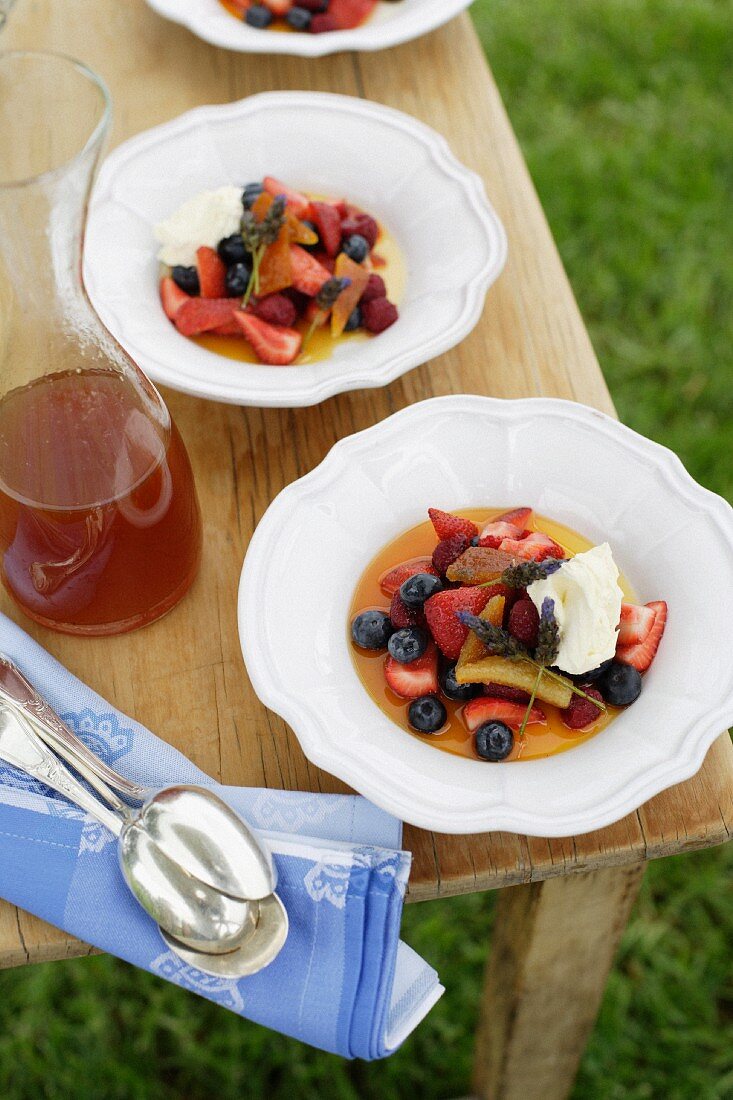 Berries with candied oranges and caramel sauce