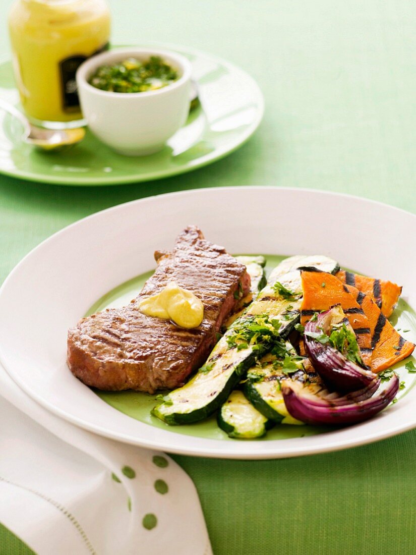 Grilled steak with vegetables and gremolata