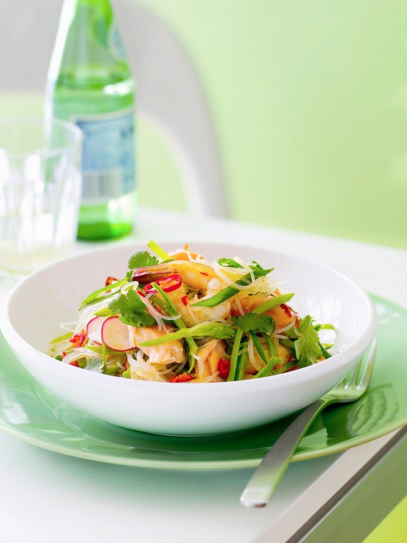 Thai rice noodle salad with vegetables and seafood