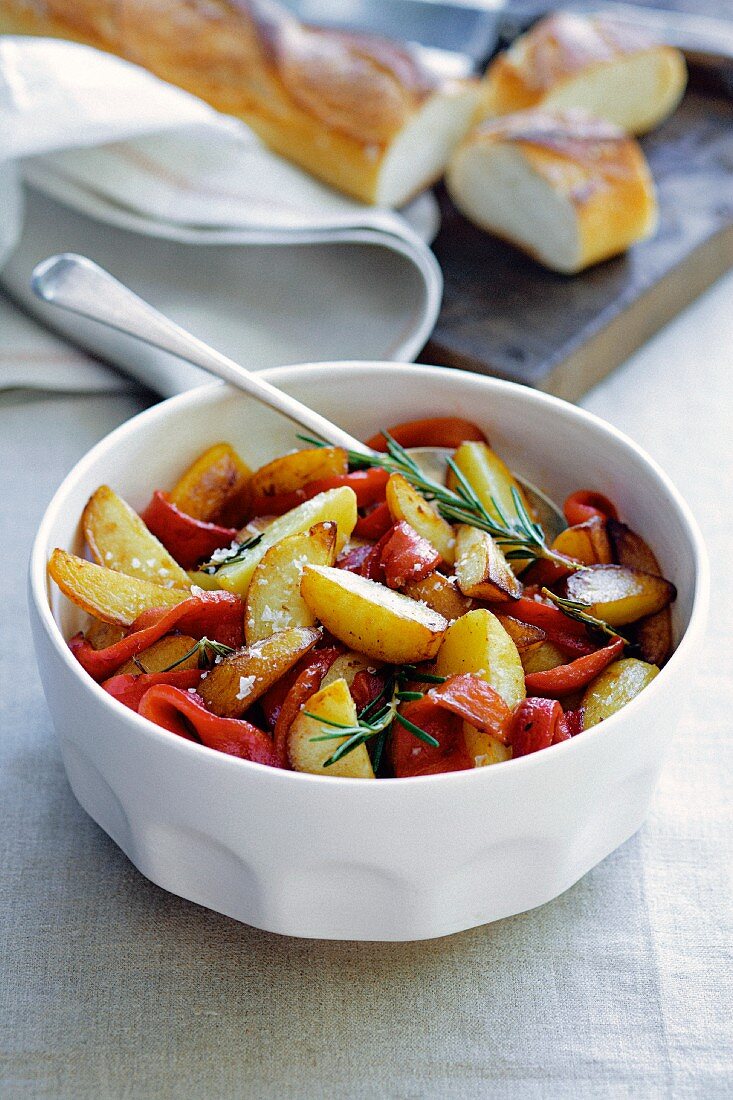 Roast potatoes with peppers and rosemary