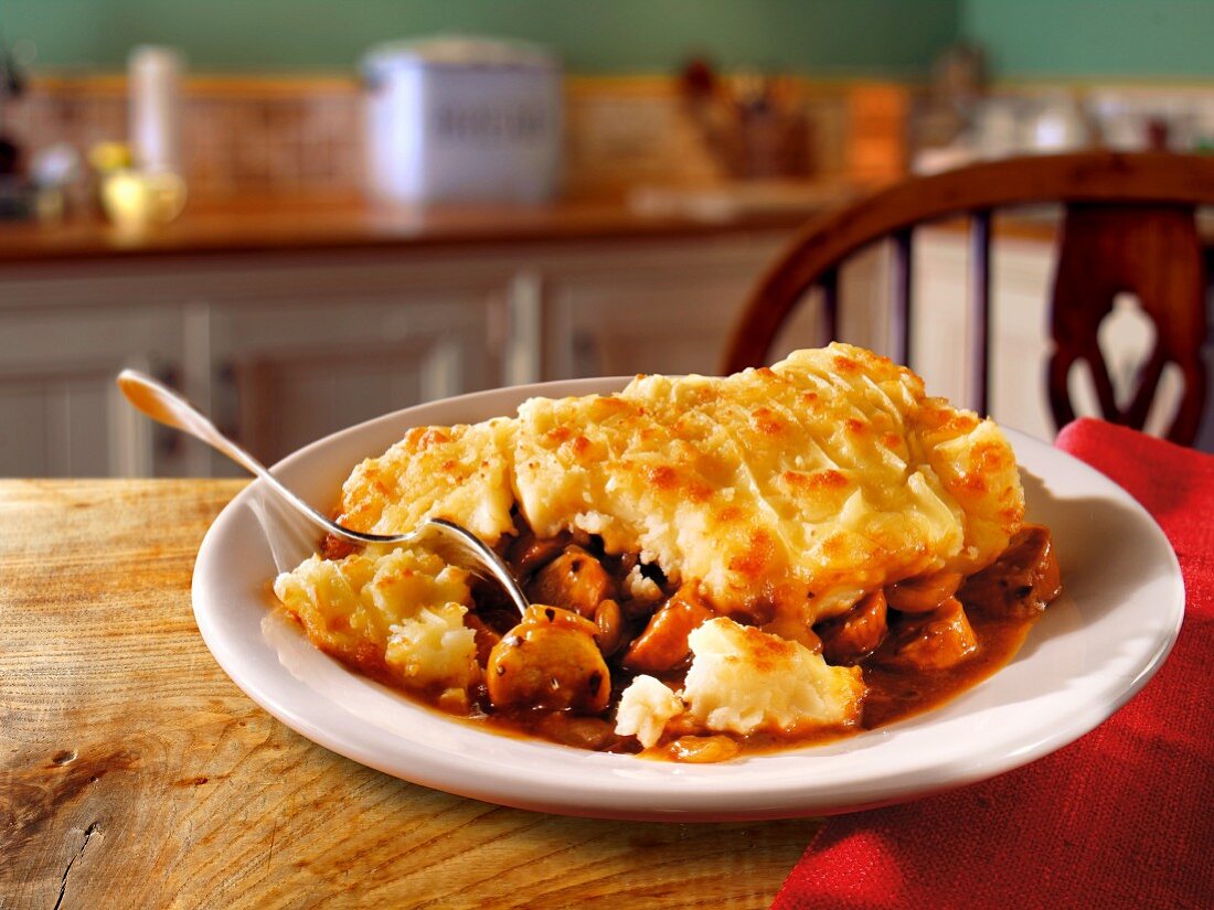 Sausage pie (sausage casserole with mashed potatoes on top, England)