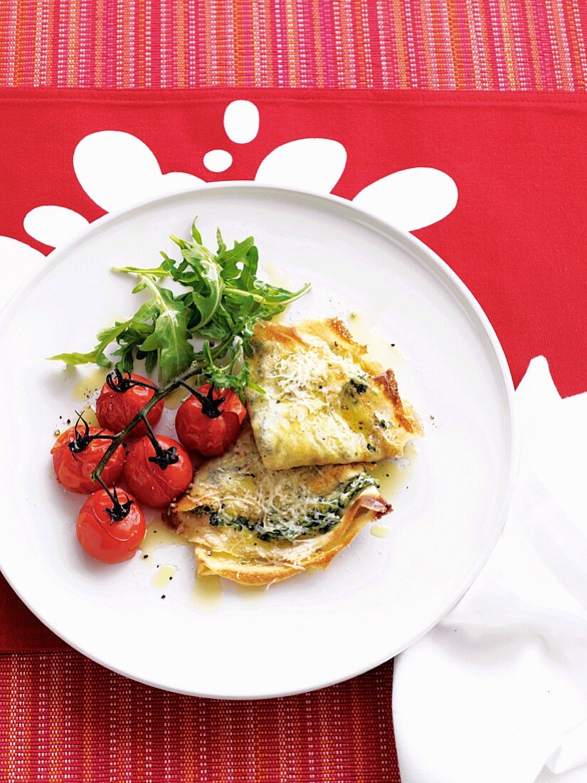 Crepes with ricotta, spinach and roasted tomatoes