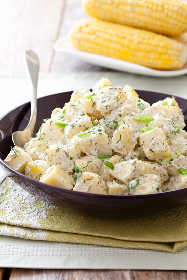 Serving Bowl of Potato Salad with Dill; Corn on the Cob