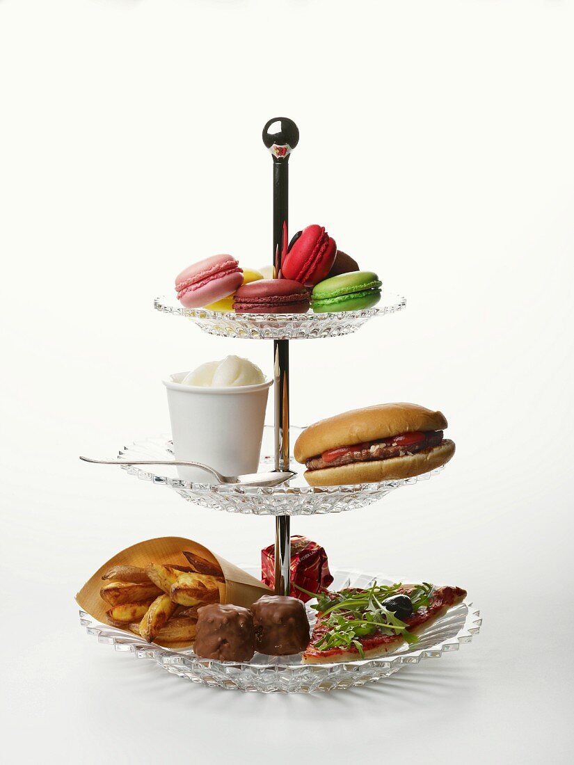 A cake stand of unhealthy food