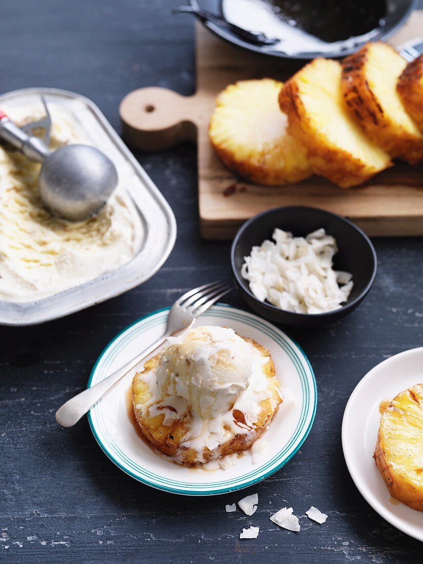 Caramelized pineapple slices with coconut ice cream