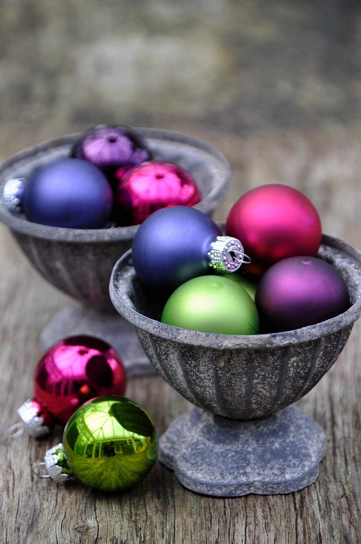 Zinc bowls with colourful Christmas baubles