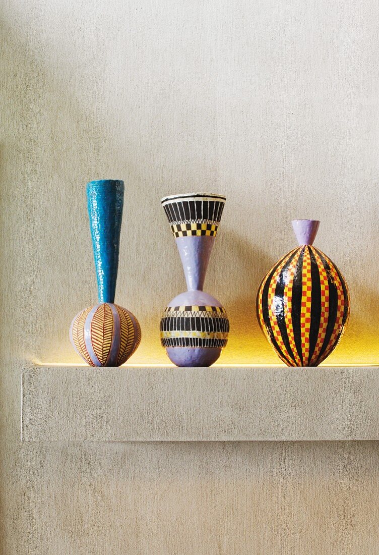 Ethnic-style vases on a built-in shelf