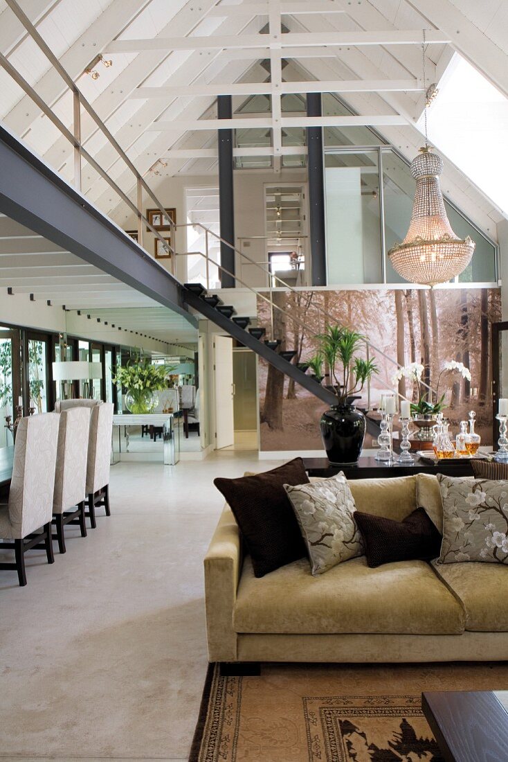 Elegant, classic furnishings open-plan interior of converted barn