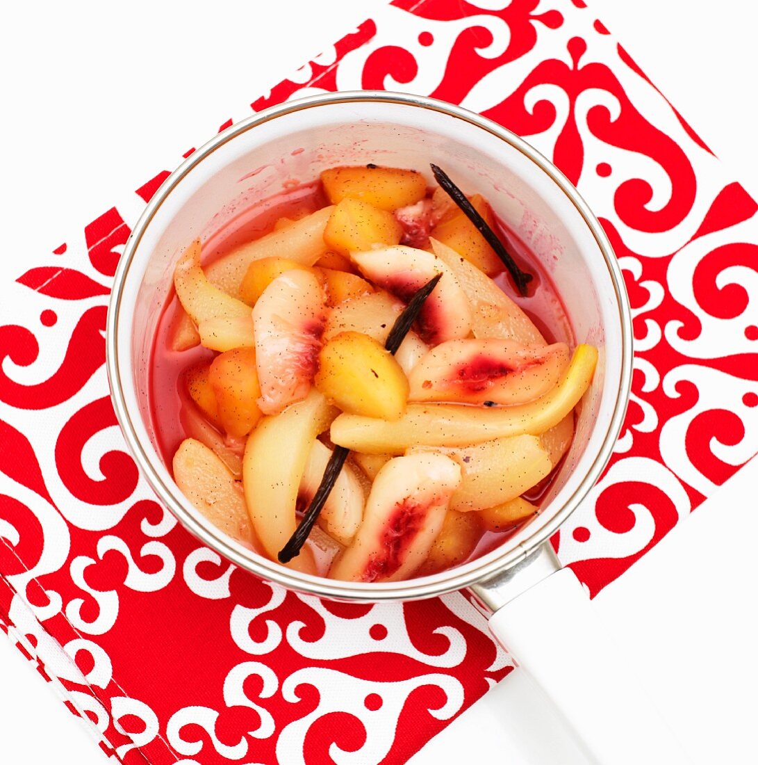 Fruit compote with vanilla pods