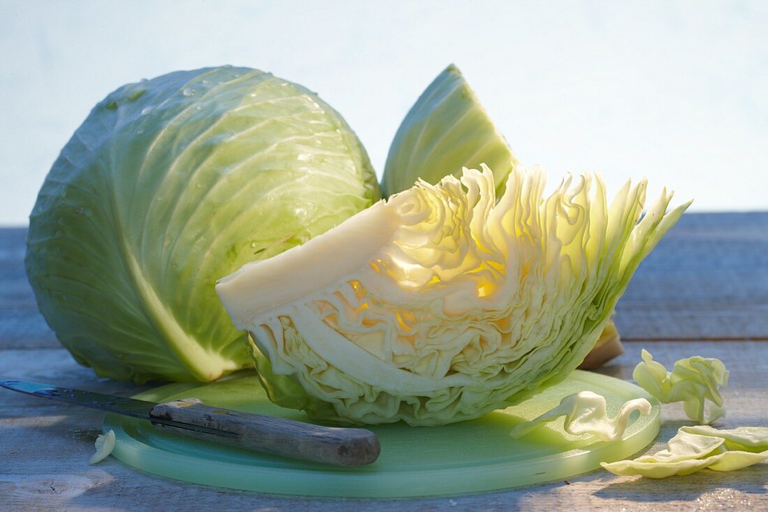 White cabbage, whole and quartered