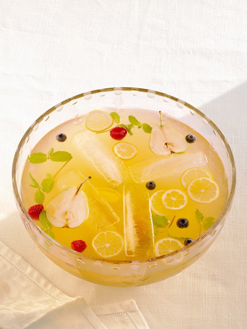 Twenty-Ten Punch with Sliced Fresh Fruit and Mint in a Punch Bowl