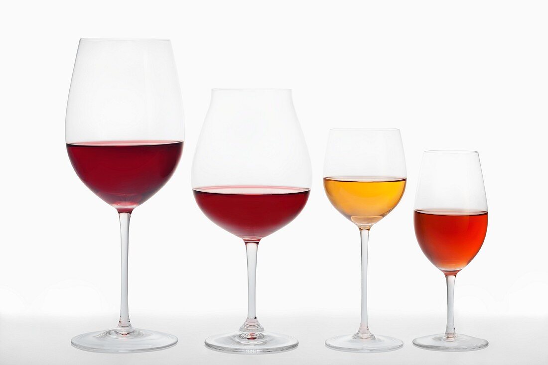 A red wine balloon glass, a large red wine balloon glass, a dessert wine glass and a liqueur wine glass