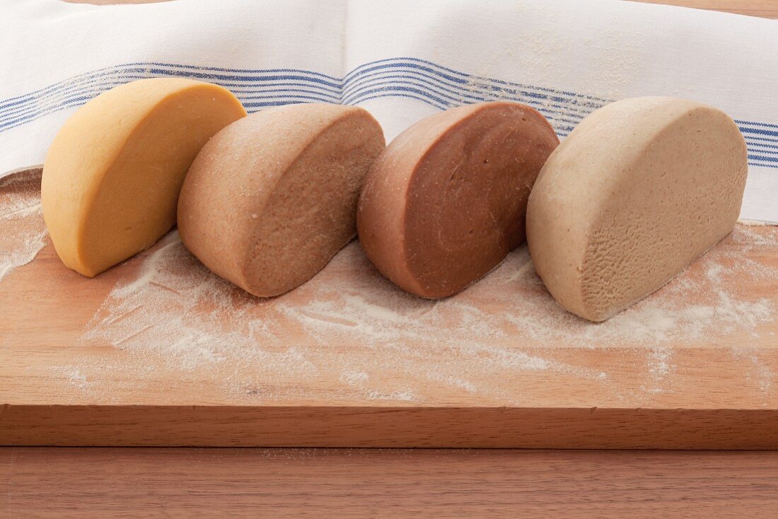 Various types of pasta dough (made from corn flour, wholemeal flour, chestnut flour and buckwheat flour)