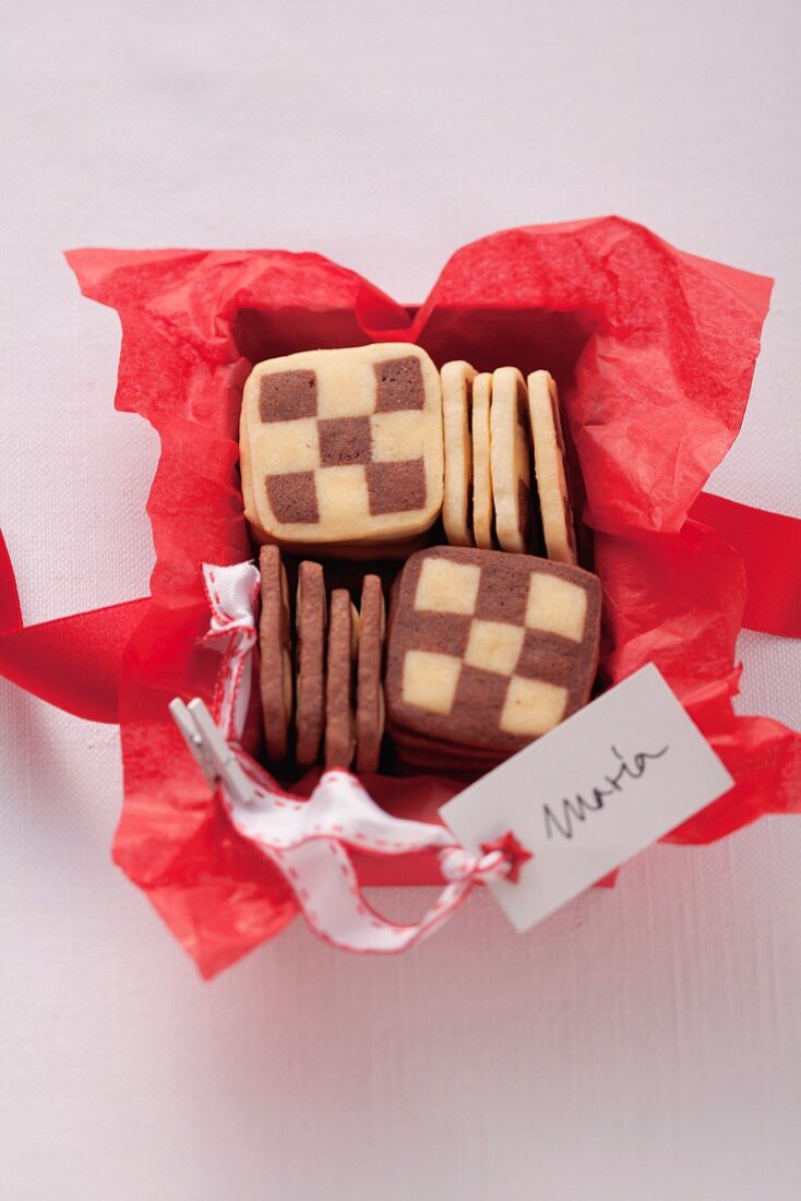 Black and white biscuits in a box as a gift