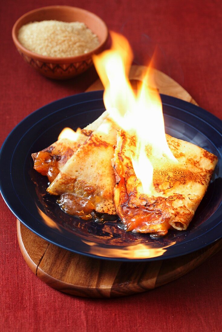 Pancakes being flambéed