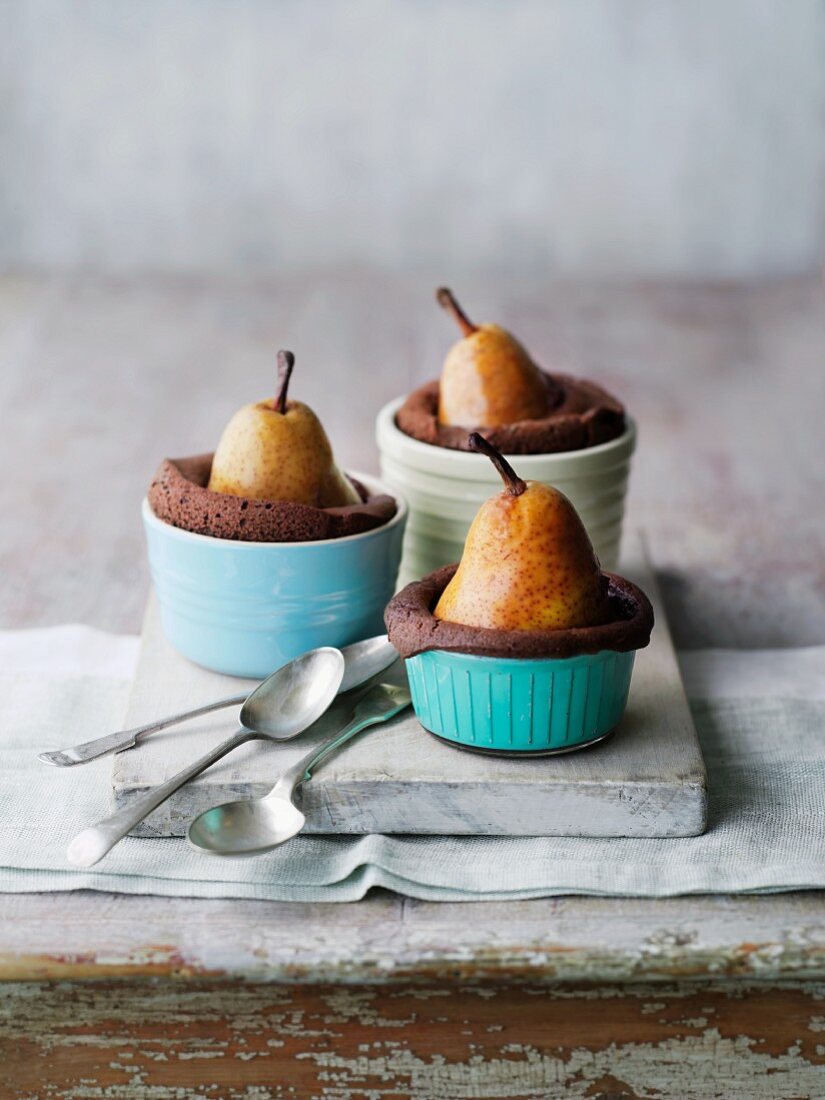 Chocolate souffles with pears