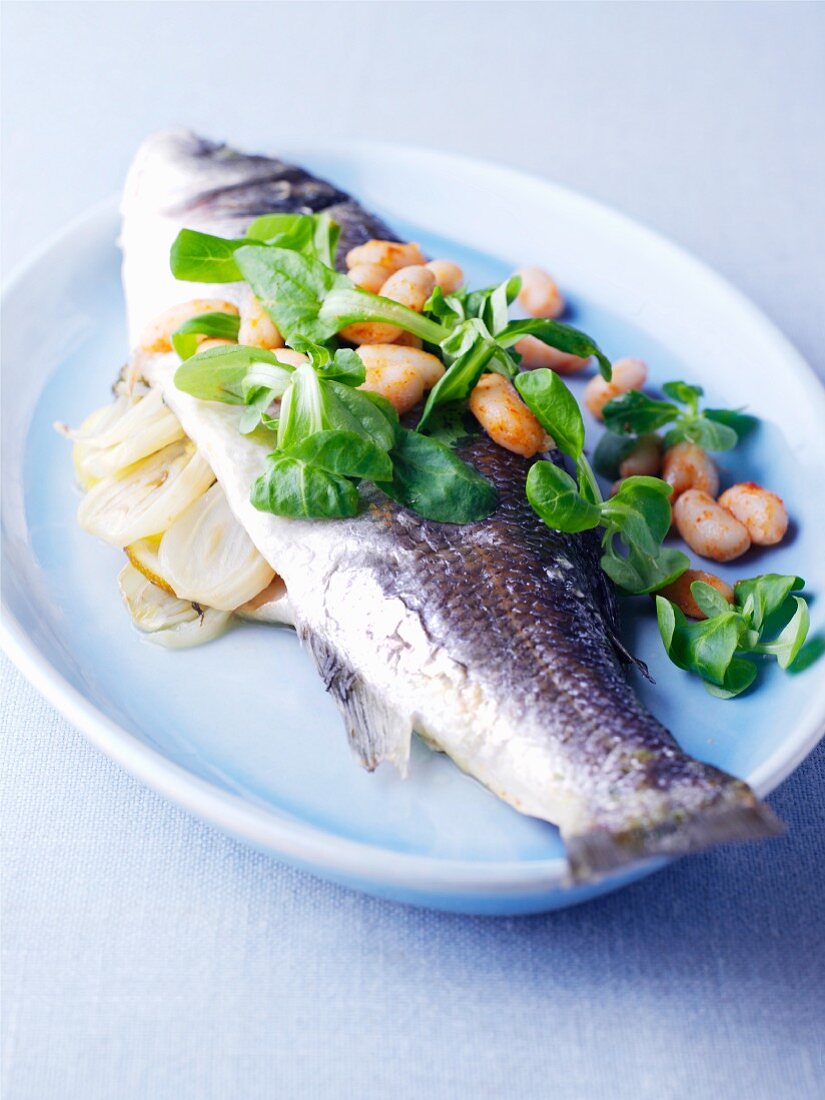Sea bass with white beans, leek and lamb's lettuce