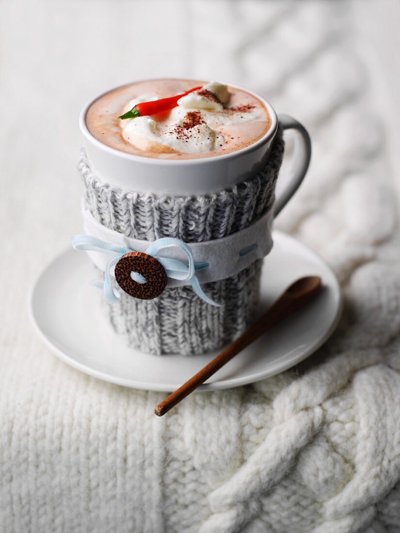Hot chocolate with cream and a chilli pepper
