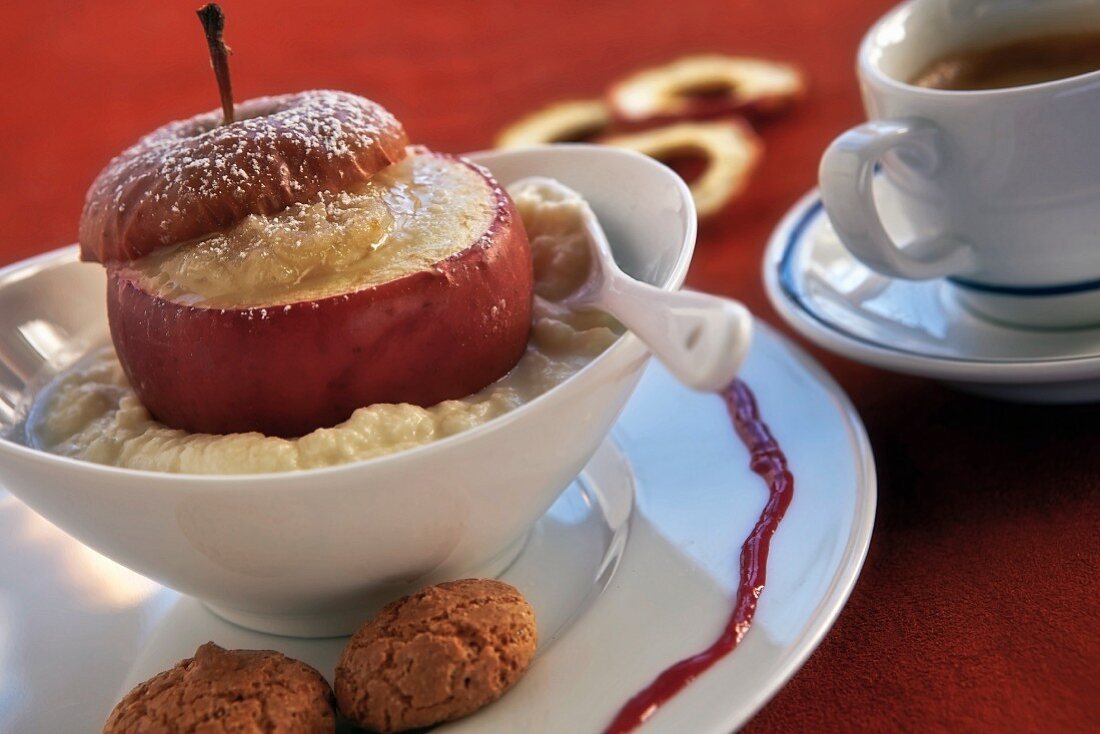 Baked apple on mascarpone cream with icing sugar, amaretti, espresso