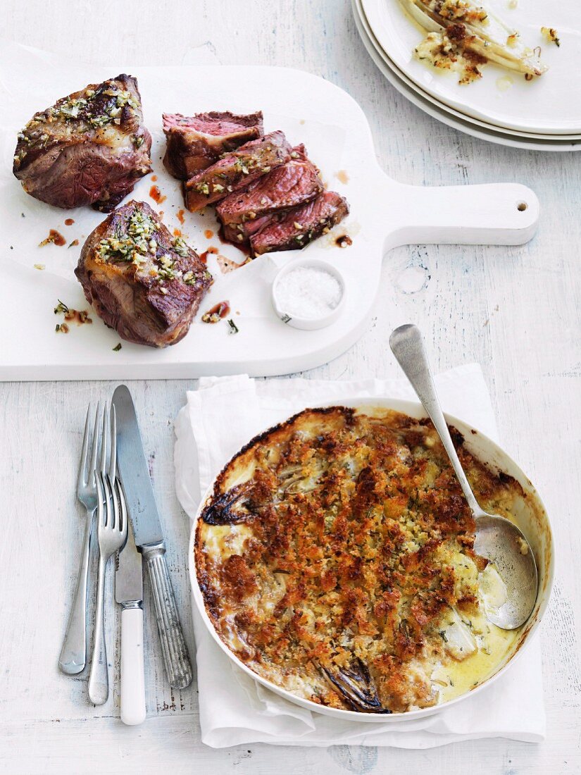 Chicory gratin with lamb steaks