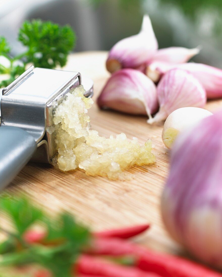 Garlic with a garlic crusher