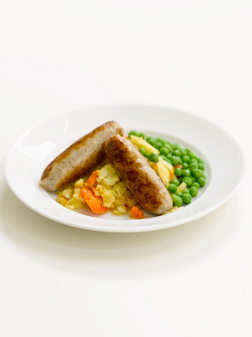 Sausages with potatoes and peas