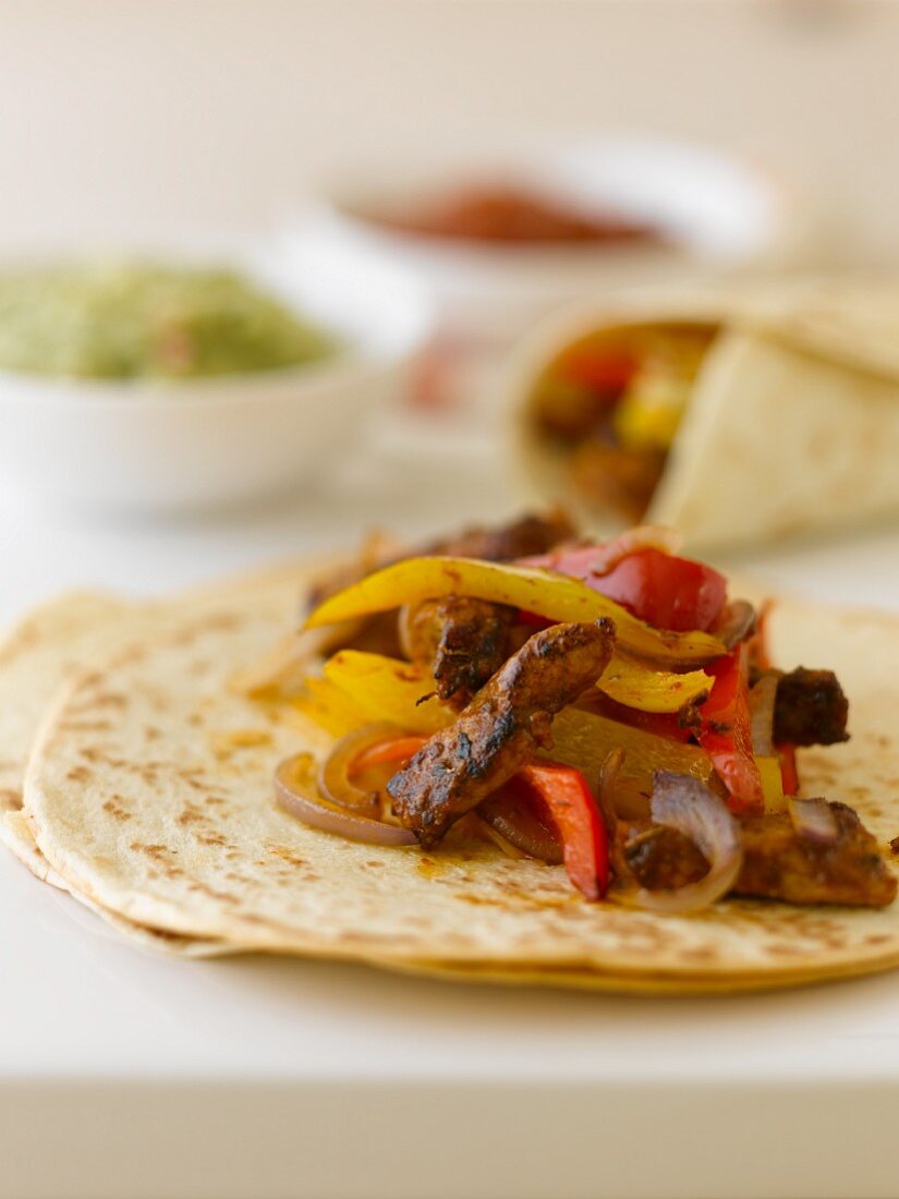 Fajitas with beef, peppers and onions (Mexico)