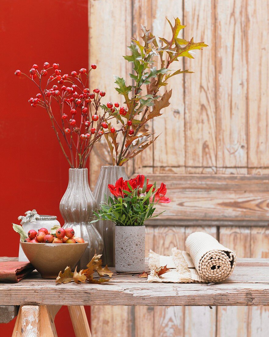 Autumn table centrepiece with rosehips