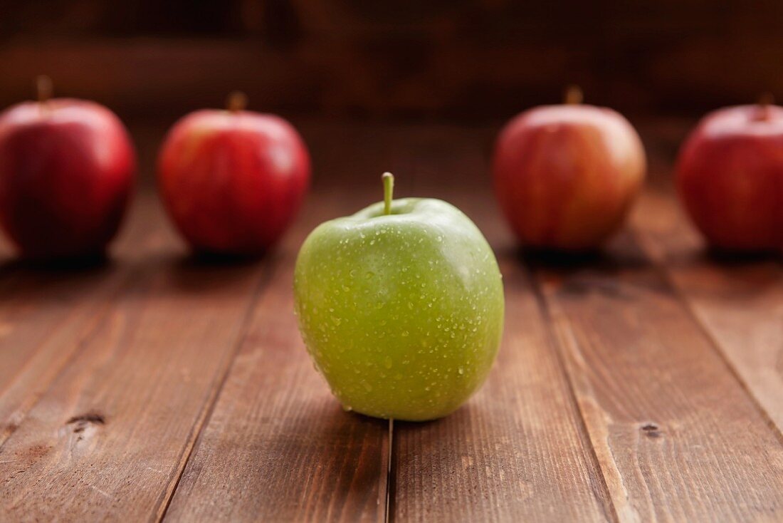 Red apples and one green apples