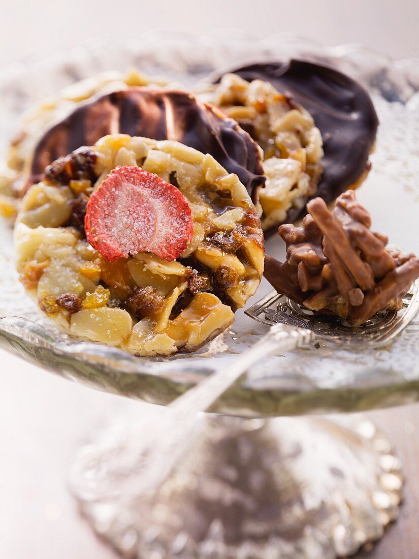 Chocolate almond brittle and florentines with dried fruits