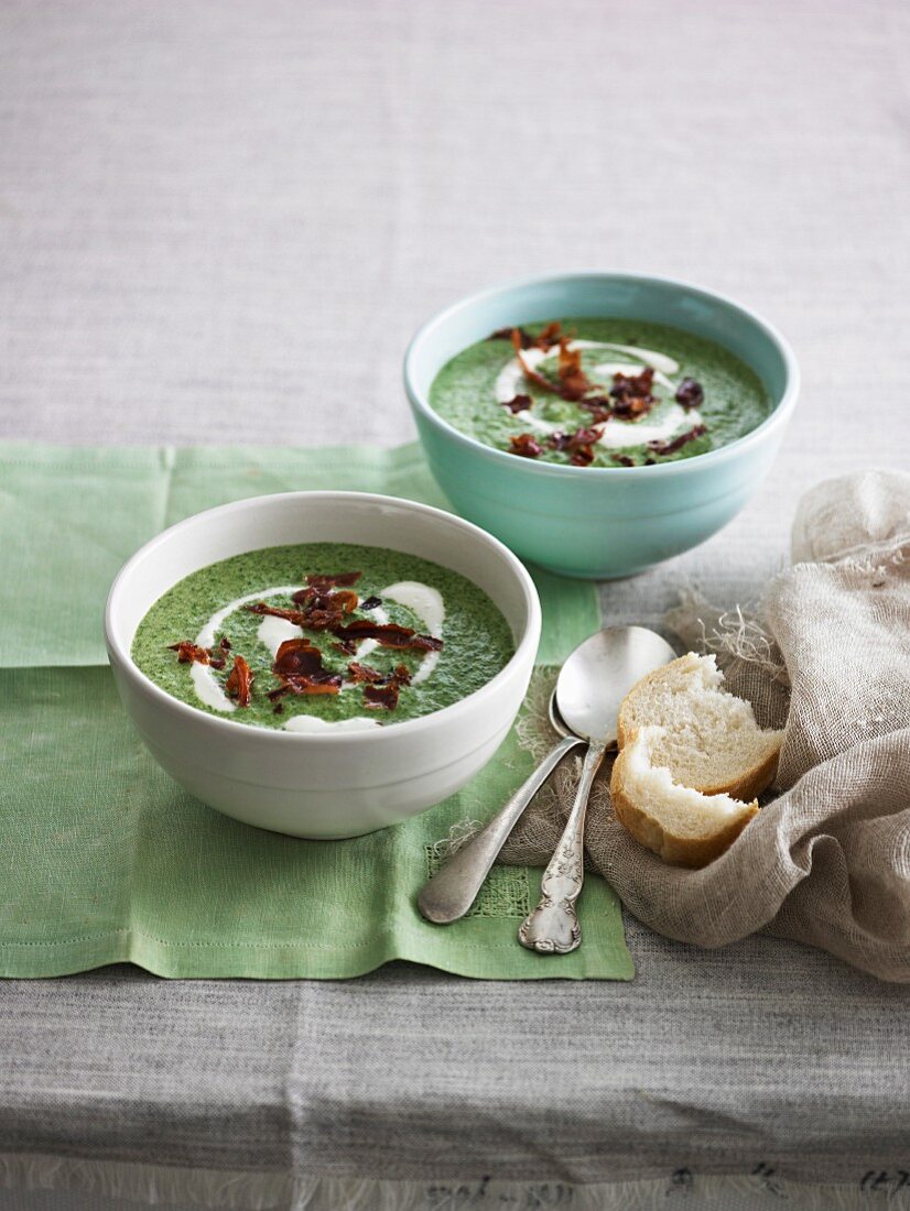 Cream of spinach soup with cream and fried ham