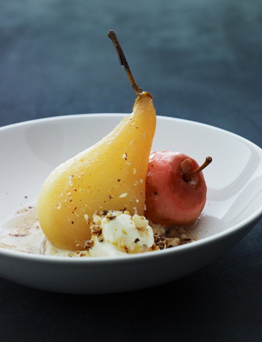 Poached pears with ice cream and nuts