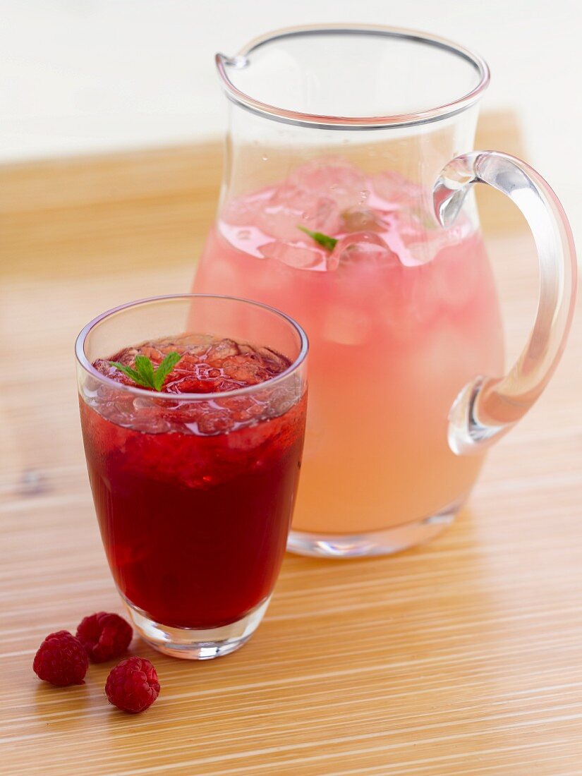 Raspberry drinks with ice cubes