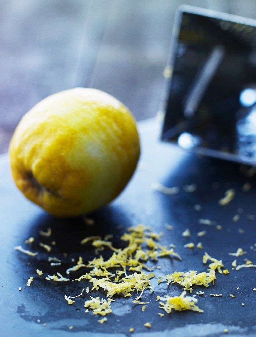 A lemon with the zest grated