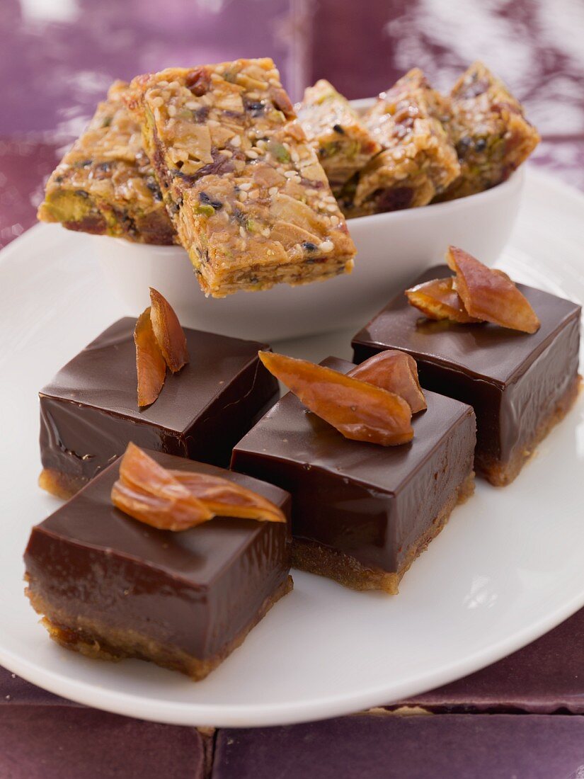 Mocha and date confectionery and sesame seed brittle with pistachios and dates