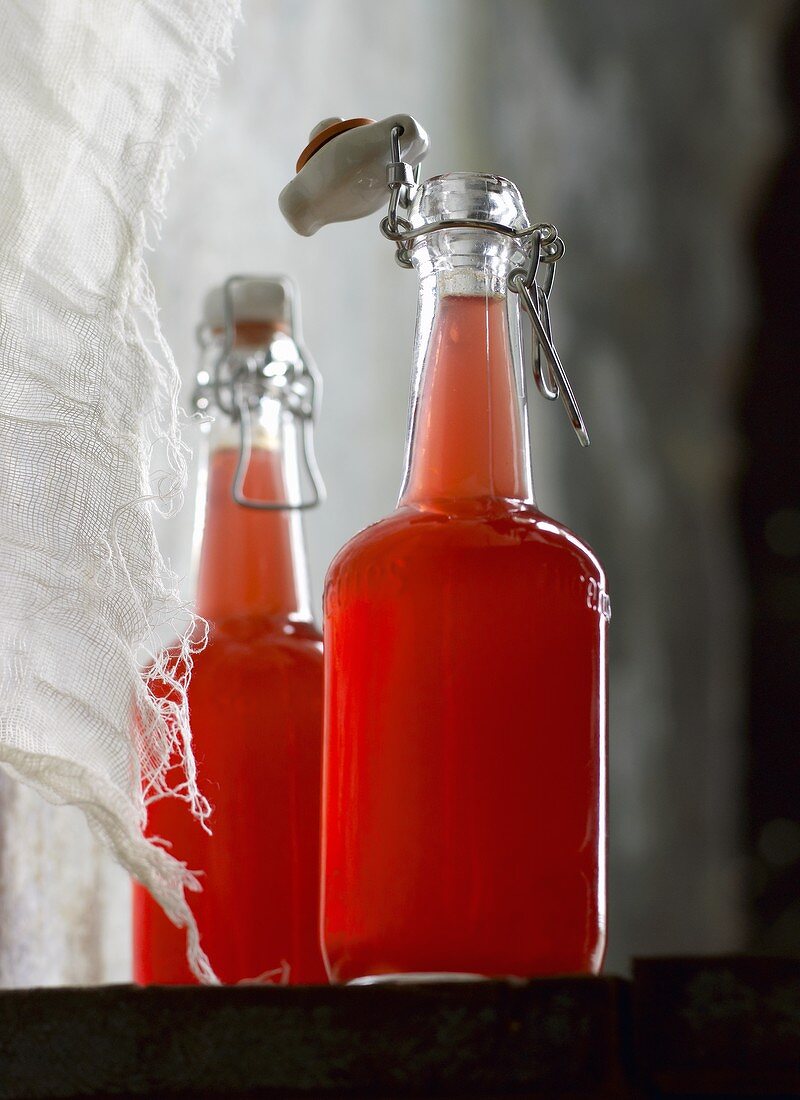 Lingon berry juice in flip-top bottles